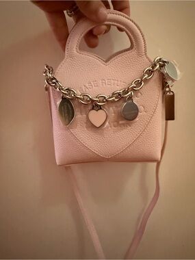 Tiffany & Co. Return To Tiffany Micro Mini Charm Tote Bag in pale pink leather